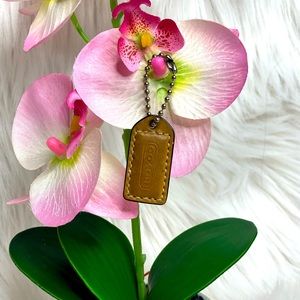 Mini Coach Light Brown Hangtag